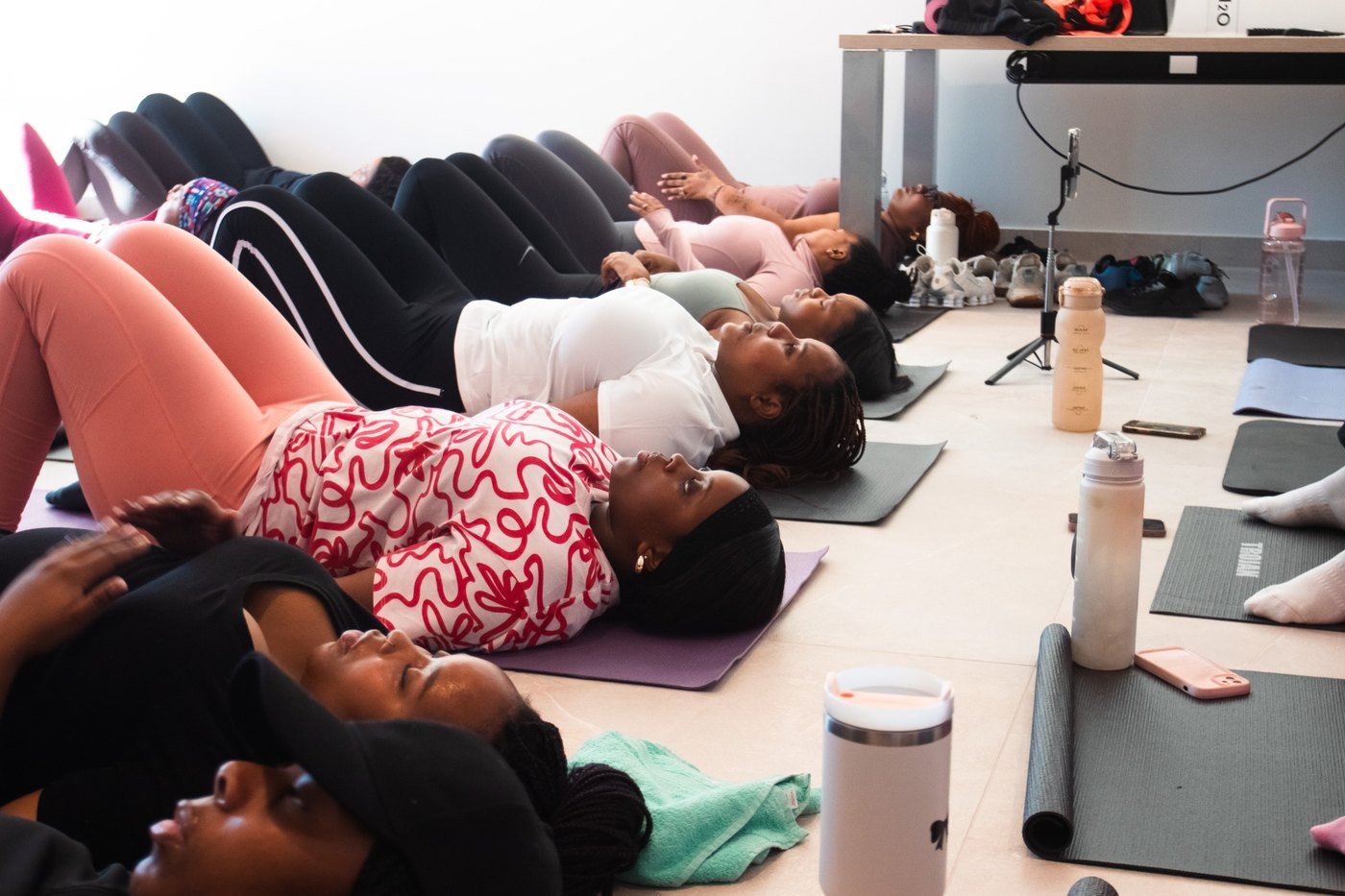 Group taking part in a restorative floor exercise