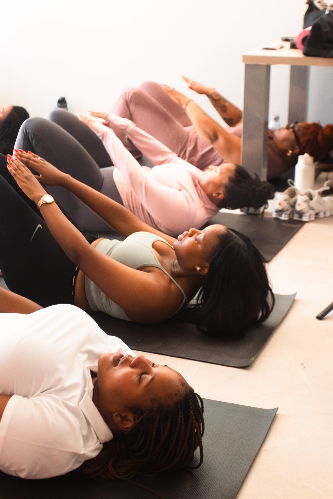 Participants resting during a guided wellness movement session